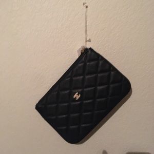 Chanel make up bag.